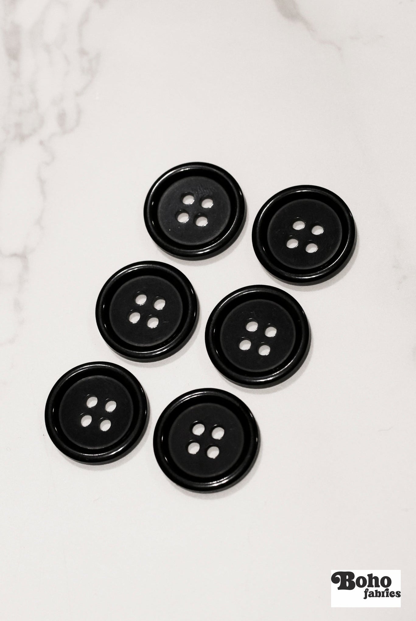 Black, 4 Hole Plastic Buttons. 28L (18mm/ 11/16") Sold per Package of 12. - Boho Fabrics - Buttons & Snaps