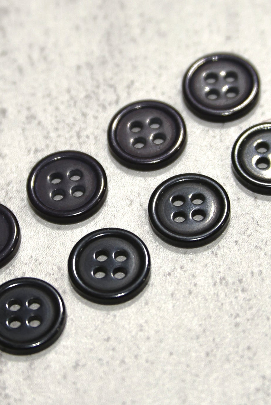 Black, Purple. Round 4 Hole Bevel Buttons. 18L (11.5mm/ 7/16") Sold per Package of 25 - Boho Fabrics - Buttons & Snaps