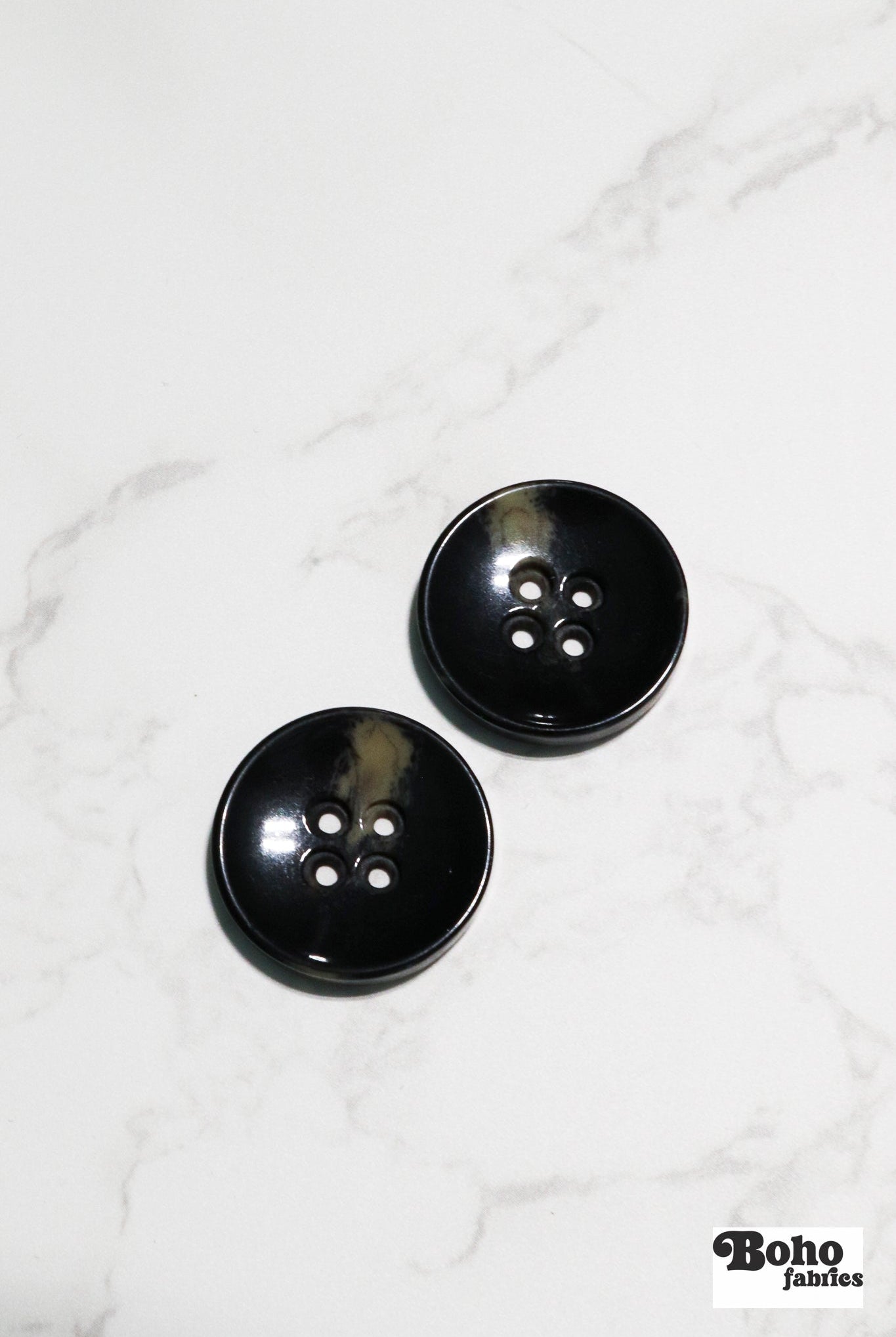 Black Tortoiseshell Round Plastic Four Hole Buttons. Available in 15mm (24L), 18mm (28L), 20mm (32L), and 28mm (44L) - Boho Fabrics - Buttons & Snaps