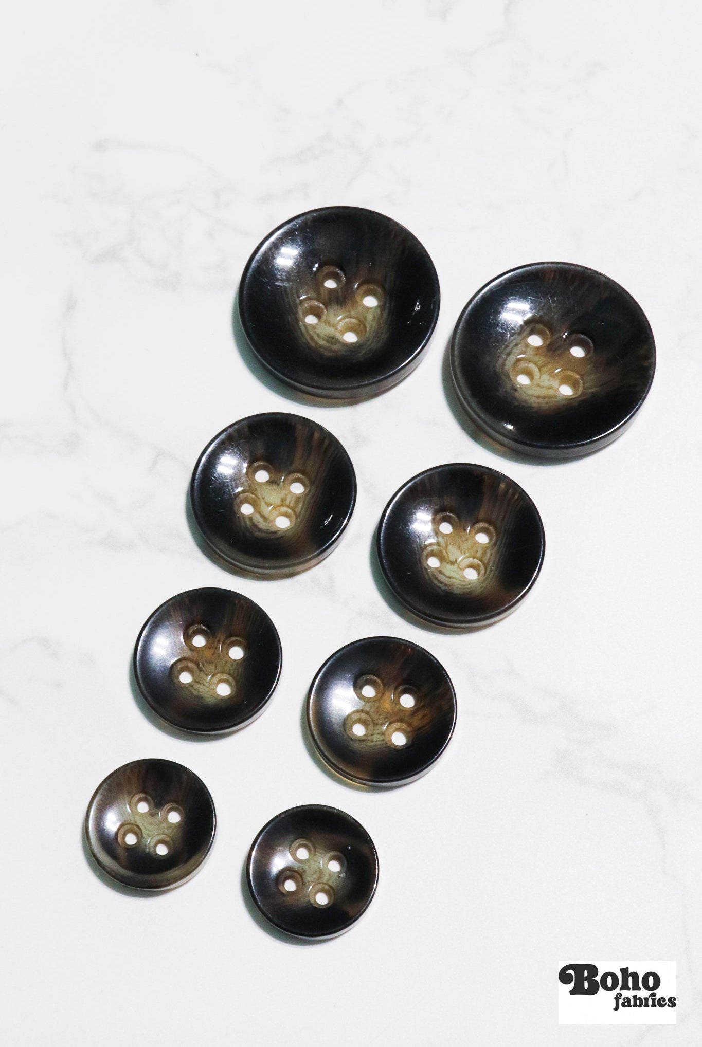 Brown Tortoiseshell Round Plastic Four Hole Buttons. Available in 15mm (24L), 18mm (28L), 20mm (32L), and 25mm (40L) - Boho Fabrics - Buttons & Snaps