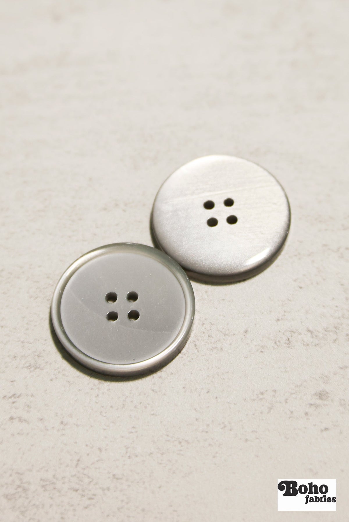 Glossy Silver/Gray Four Hole Plastic Buttons. 24L (15mm/ 5/8"), 28L, (18mm/ 11/16"), 32L (20mm / 13/16"), 36L (23mm, 7/8"), 40L (25mm/ 1"), 44L (28mm/ 1 1/8") - Boho Fabrics - Buttons & Snaps