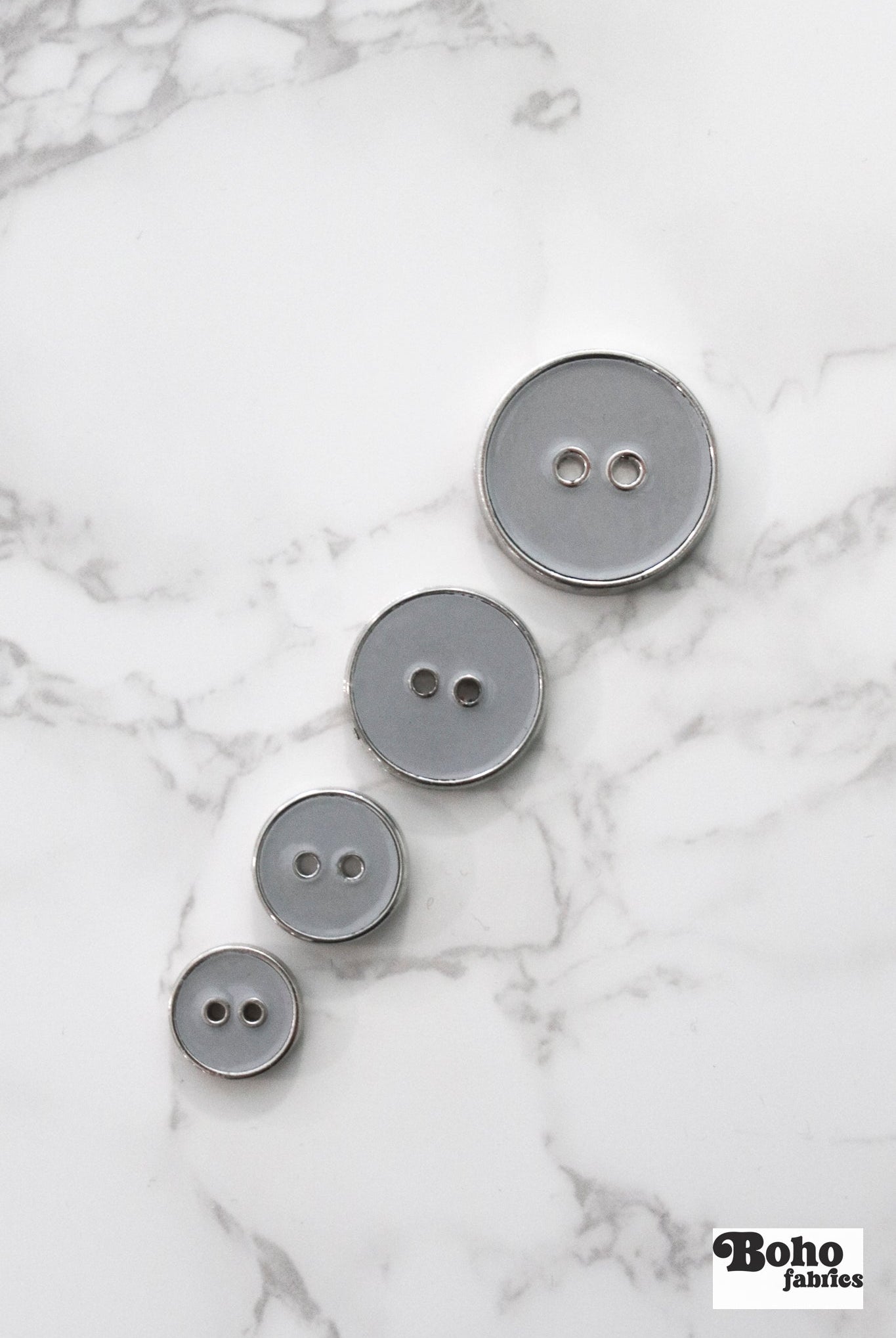 Light Gray Silver Rimmed Two - hole Buttons. Available in 12.5mm (20L), 15mm (24L), 23mm (36L), and 28mm (44L) (Copy) - Boho Fabrics - Buttons & Snaps
