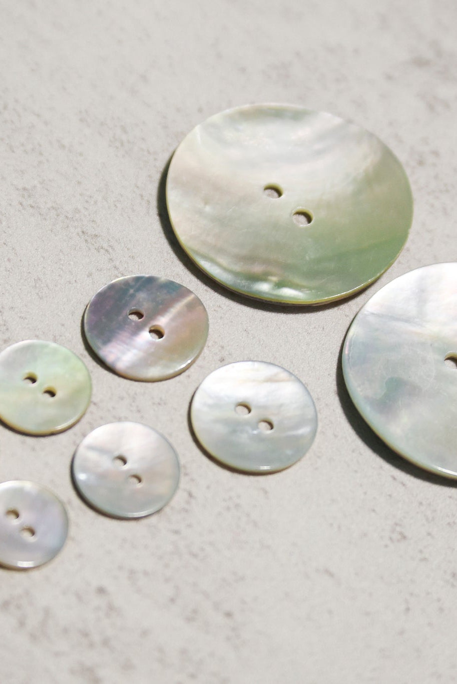 Natural Agoya Shell 2-Hole Buttons. 18L (11.5mm/ 7/16"), 20L, (12.5mm/ 1/2"), 24L (15mm / 5/8"), 48L (30mm, 1 3/16") - Boho Fabrics - Buttons & Snaps