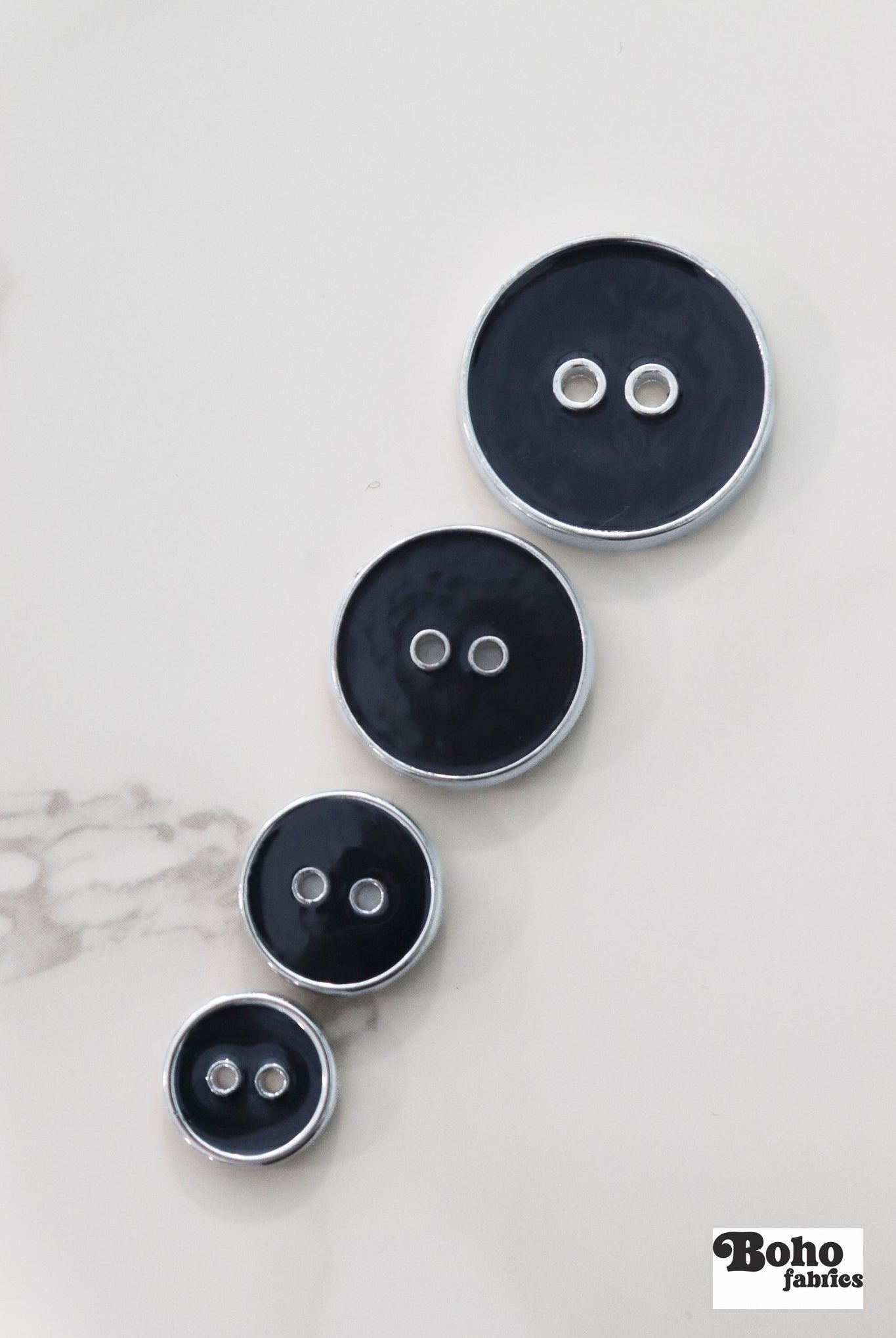 Navy Blue Silver Rimmed Two - hole Buttons. Available in 12.5mm (20L), 15mm (24L), 23mm (36L), and 28mm (44L) - Boho Fabrics - Buttons & Snaps