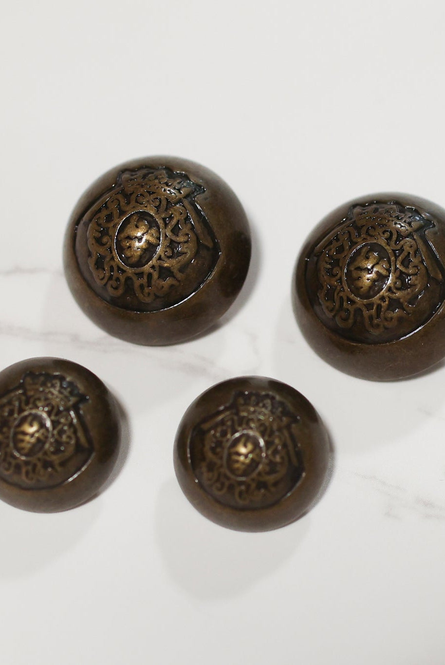 Royalty Crest Bronze Plastic, Dome Shank Button. Available in 11/16" (18mm, 28L) and 15/16", (24mm, 38L) - Boho Fabrics - Buttons & Snaps