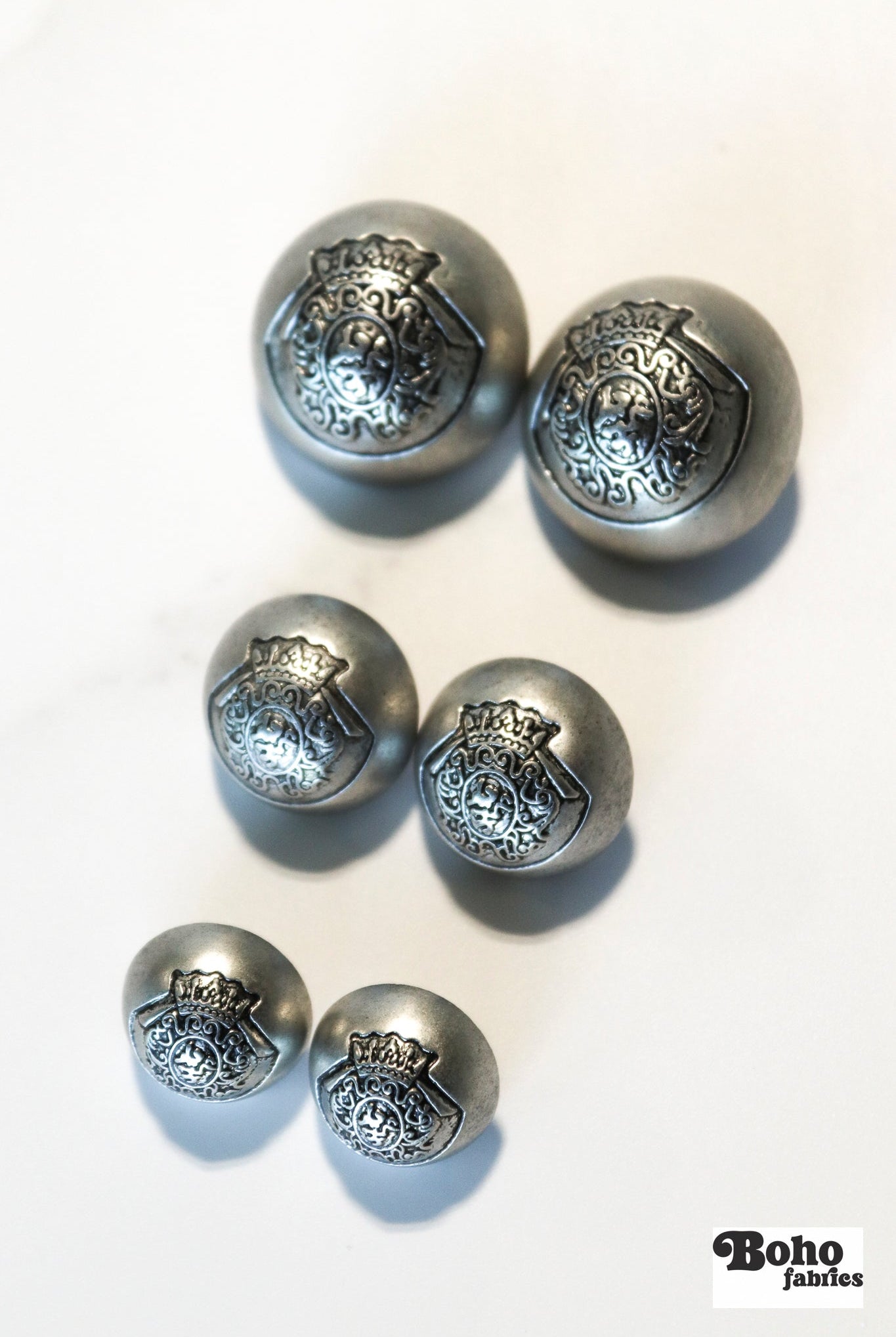 Royalty Crest Silver Plastic, Dome Shank Button. Available in 5/8" (15mm, 24L), 11/16", (18mm, 28L) and 7/8", (23mm, 36L) - Boho Fabrics - Buttons & Snaps