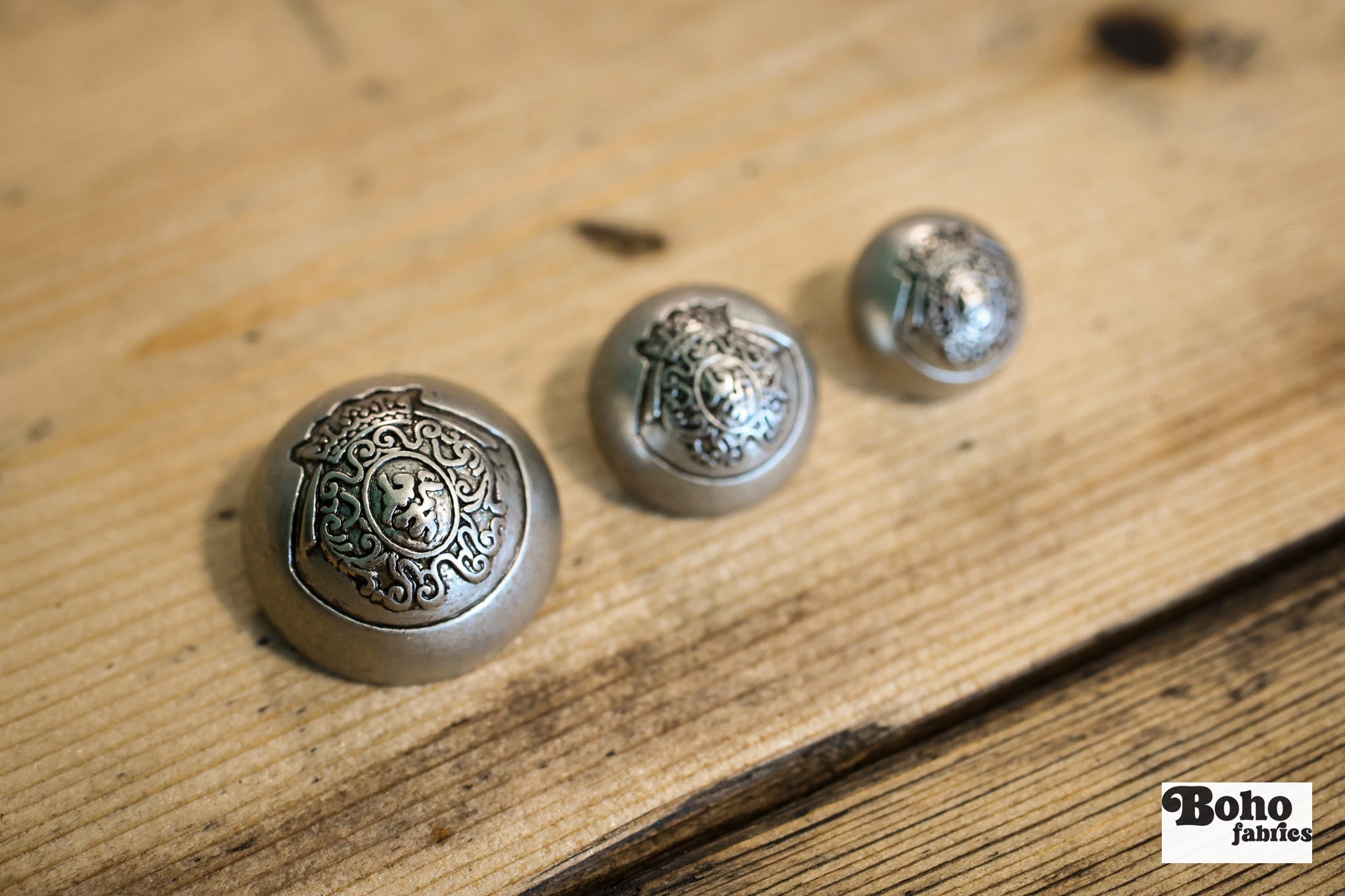 Royalty Crest Silver Plastic, Dome Shank Button. Available in 5/8" (15mm, 24L), 11/16", (18mm, 28L) and 7/8", (23mm, 36L) - Boho Fabrics - Buttons & Snaps