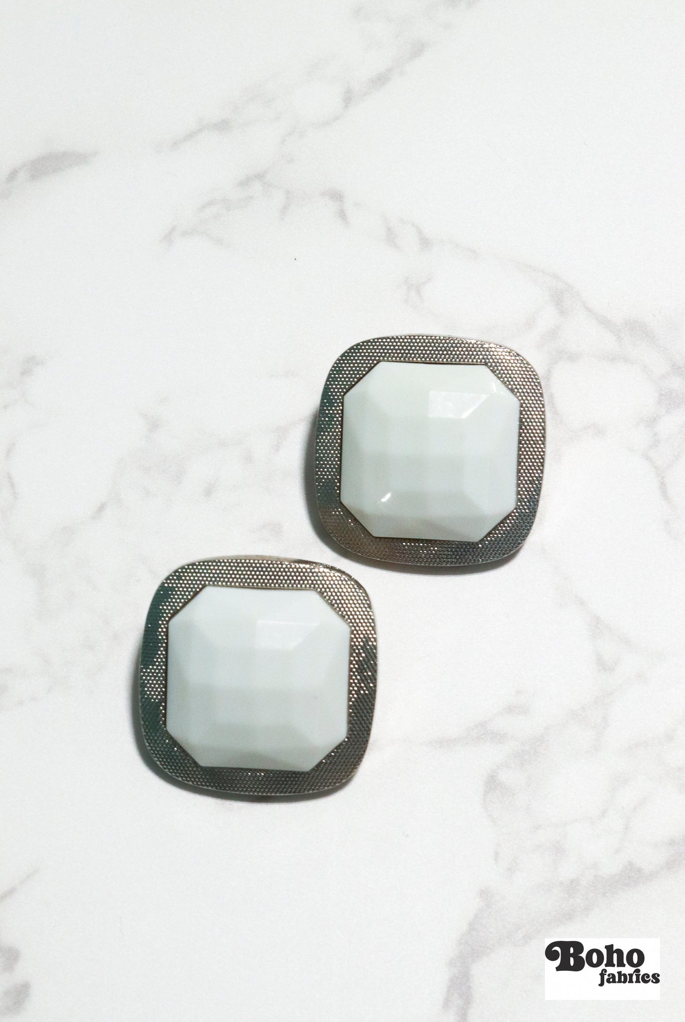 Silver Rimmed White Faceted Square Plastic Shank Buttons. Available in 15mm (24L), 18mm (28L), 25mm (40L), and 28mm (44L) - Boho Fabrics - Buttons & Snaps