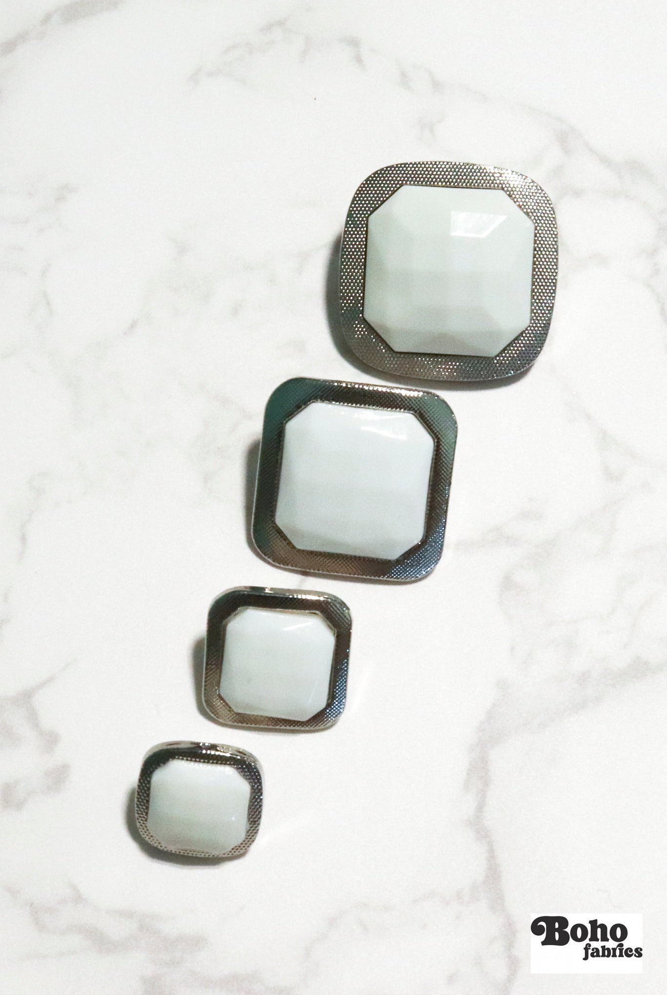 Silver Rimmed White Faceted Square Plastic Shank Buttons. Available in 15mm (24L), 18mm (28L), 25mm (40L), and 28mm (44L) - Boho Fabrics - Buttons & Snaps