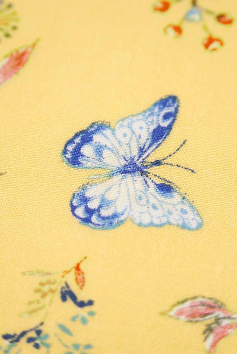 Whimsical Blue Butterfly Garden on Yellow Rayon Crepe Woven Fabric - Boho Fabrics - Crepe, Woven
