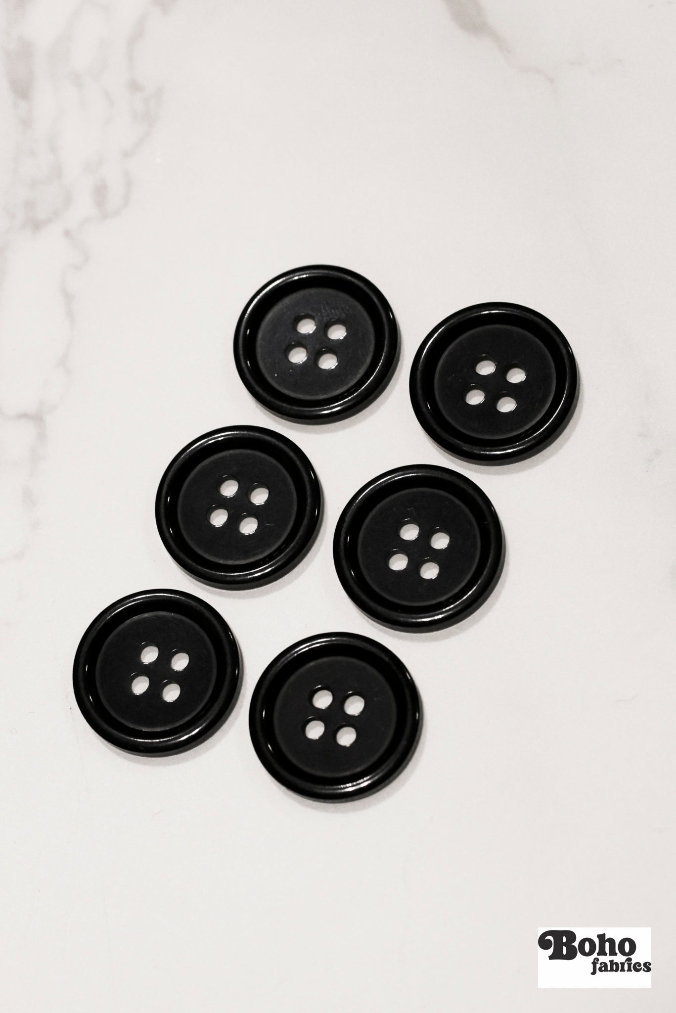 Black, 4 Hole Plastic Buttons. 28L (18mm/ 11/16") Sold per Package of 12. - Boho Fabrics - Buttons & Snaps