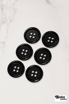 Black, 4 Hole Plastic Buttons. 28L (18mm/ 11/16") Sold per Package of 12. - Boho Fabrics - Buttons & Snaps