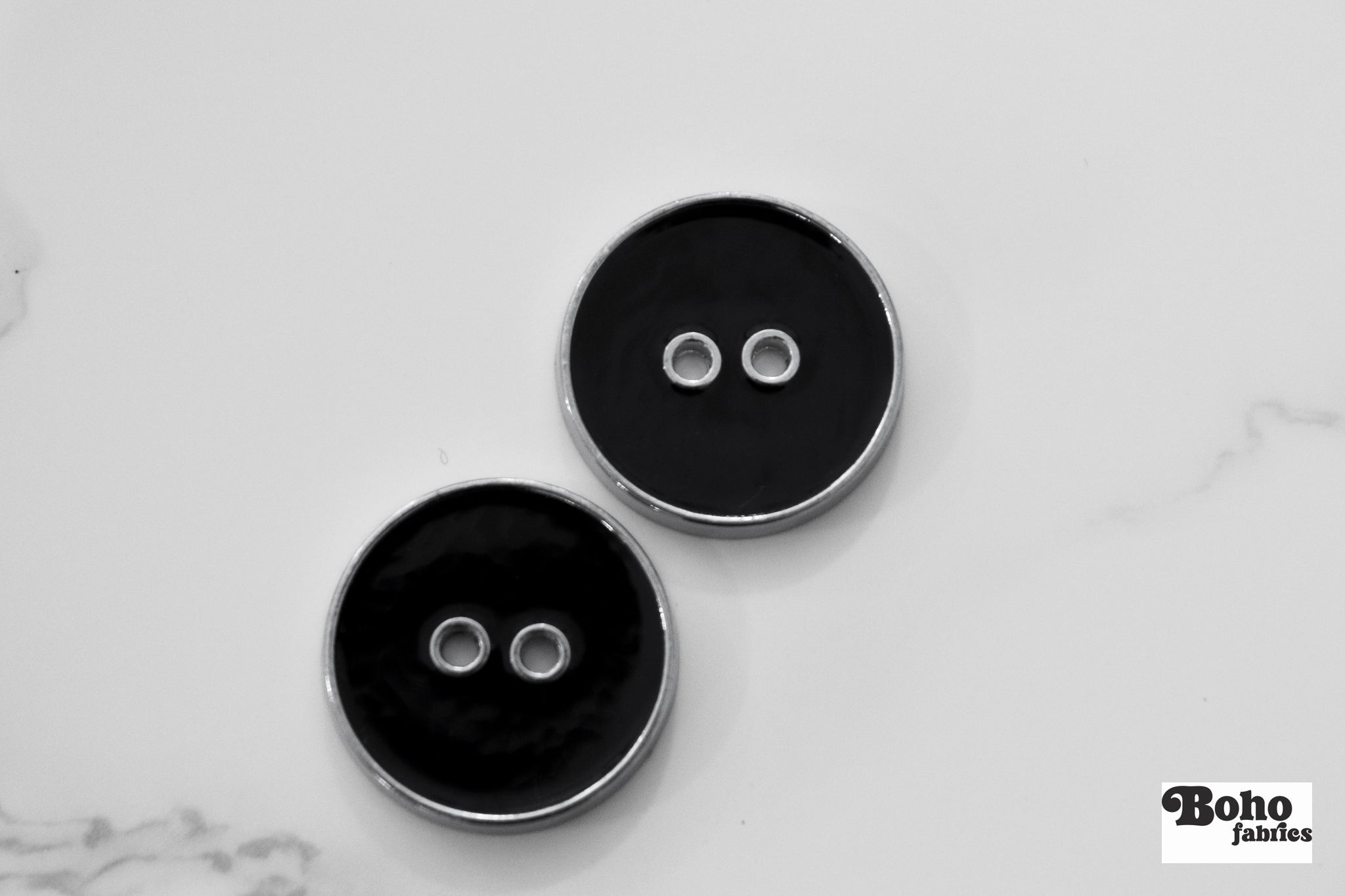 Black Silver Rimmed Two - hole Buttons. Available in 15mm (24L), 23mm (36L), and 28mm (44L) - Boho Fabrics - Buttons & Snaps