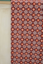 Carnaby Daisy in White & Orange on Brown, Athletic Knit Fabric (Small Flaw) - Boho Fabrics - Athletic Knit Fabric