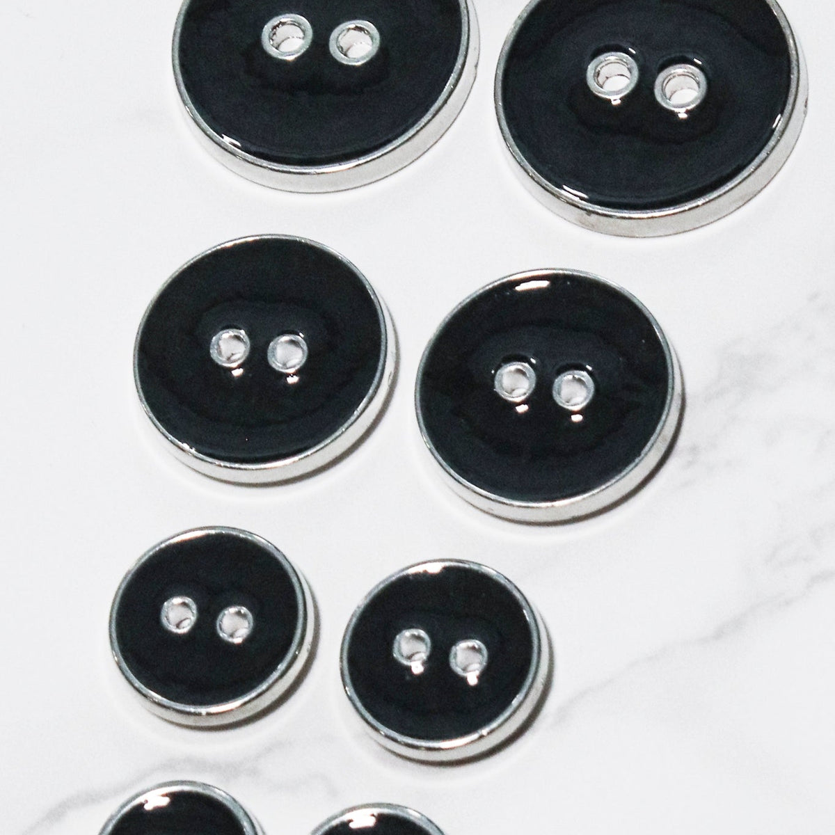 Dark Charcoal Silver Rimmed Two-hole Buttons. Available in 12.5mm (20L ...