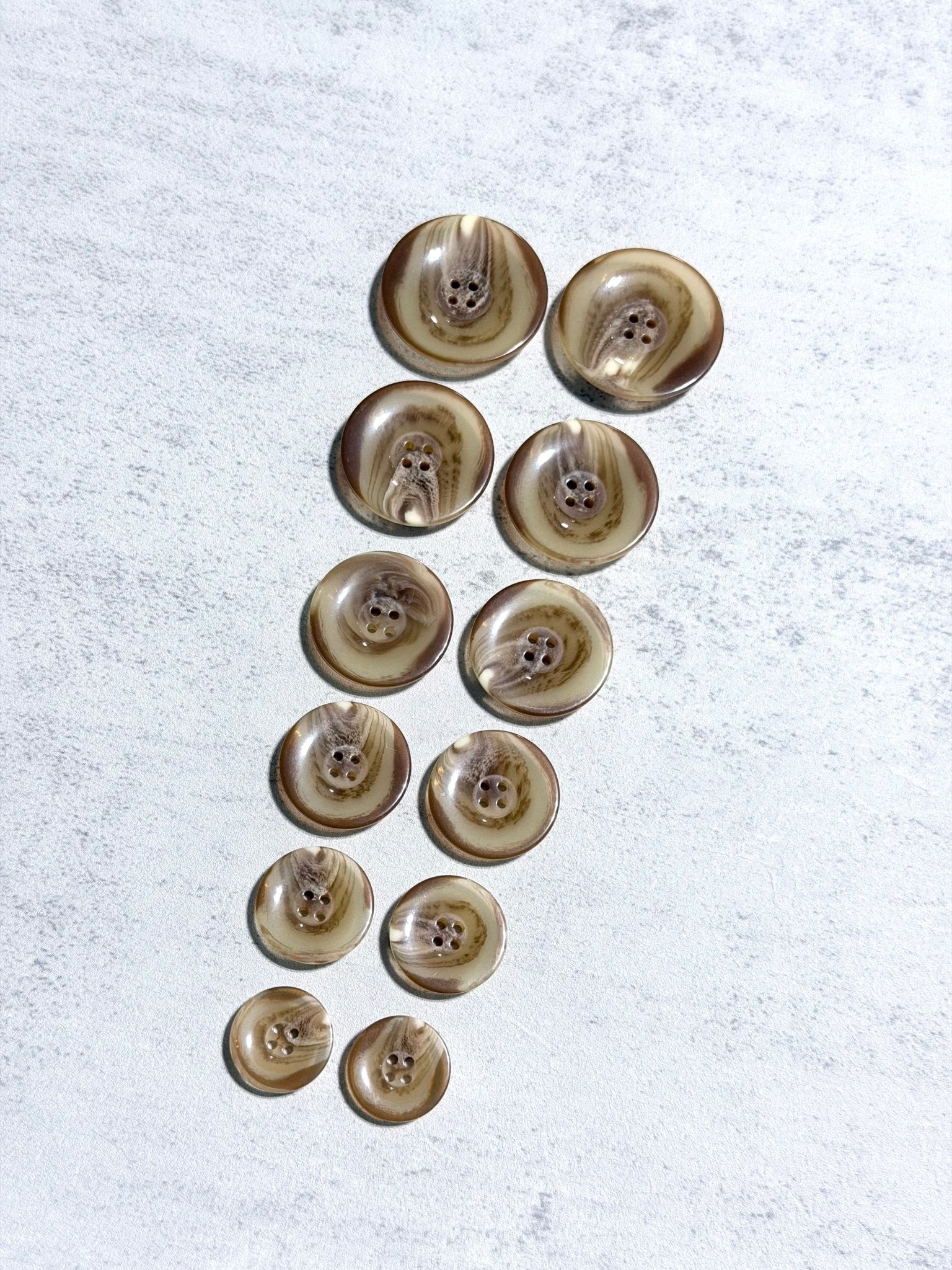 Glossy Beige Tortoiseshell Four Hole Plastic Buttons. 24L (15mm/ 5/8"), 28L, (18mm/ 11/16"), 32L (20mm / 13/16"), 36L (23mm, 7/8"), 40L (25mm/ 1"), 44L (28mm/ 1 1/8") - Boho Fabrics - Buttons & Snaps