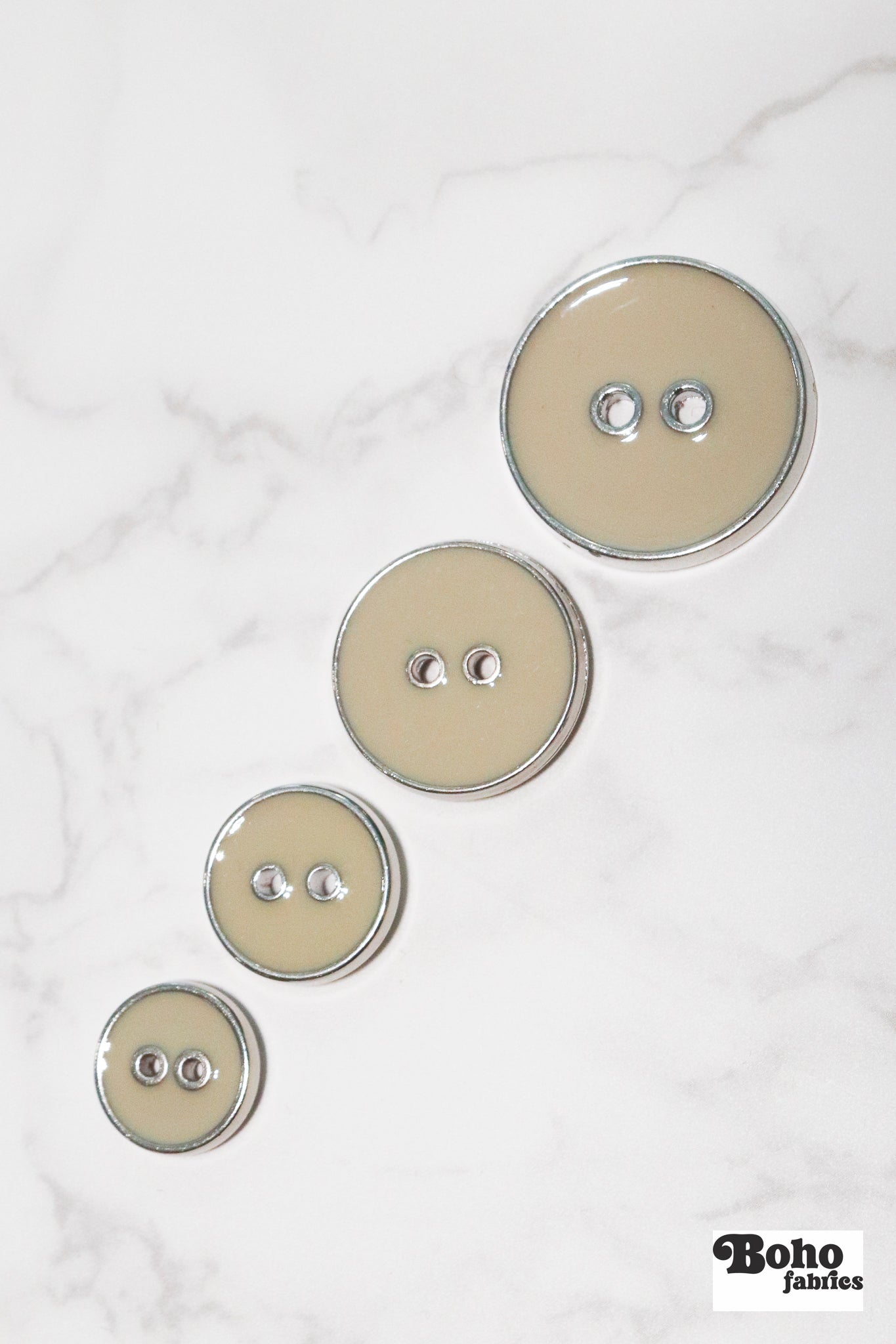 Khaki Silver Rimmed Two - hole Buttons. Available in 12.5mm (20L), 15mm (24L), 23mm (36L), and 28mm (44L) - Boho Fabrics - Buttons & Snaps