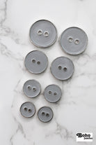 Light Gray Silver Rimmed Two - hole Buttons. Available in 12.5mm (20L), 15mm (24L), 23mm (36L), and 28mm (44L) (Copy) - Boho Fabrics - Buttons & Snaps