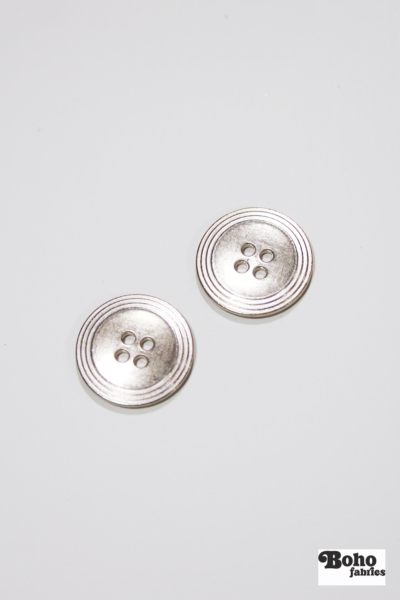 Nickel 4-Hole Buttons. 22L (14mm / 9/16"), 28L (18mm / 11/16"), 34L (21mm / 7/8"), 40L (25mm / 1") - Boho Fabrics - Buttons & Snaps