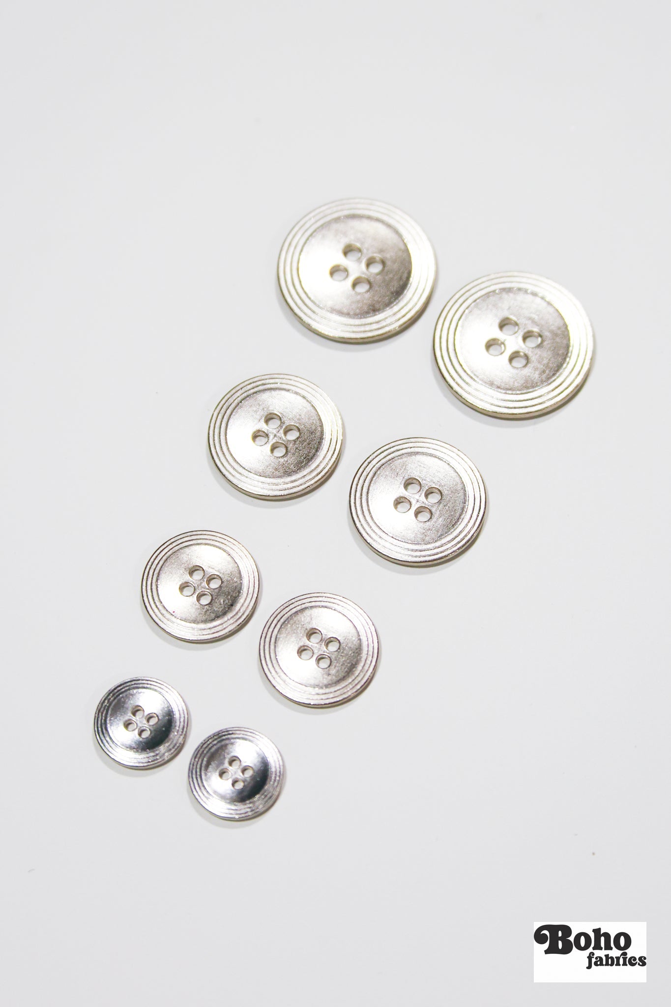 Nickel 4-Hole Buttons. 22L (14mm / 9/16"), 28L (18mm / 11/16"), 34L (21mm / 7/8"), 40L (25mm / 1") - Boho Fabrics - Buttons & Snaps