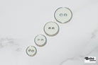Off White Silver Rimmed Two - hole Buttons. Available in 12.5mm (20L), 15mm (24L), 19mm (30L), 23mm (36L) - Boho Fabrics - Buttons & Snaps