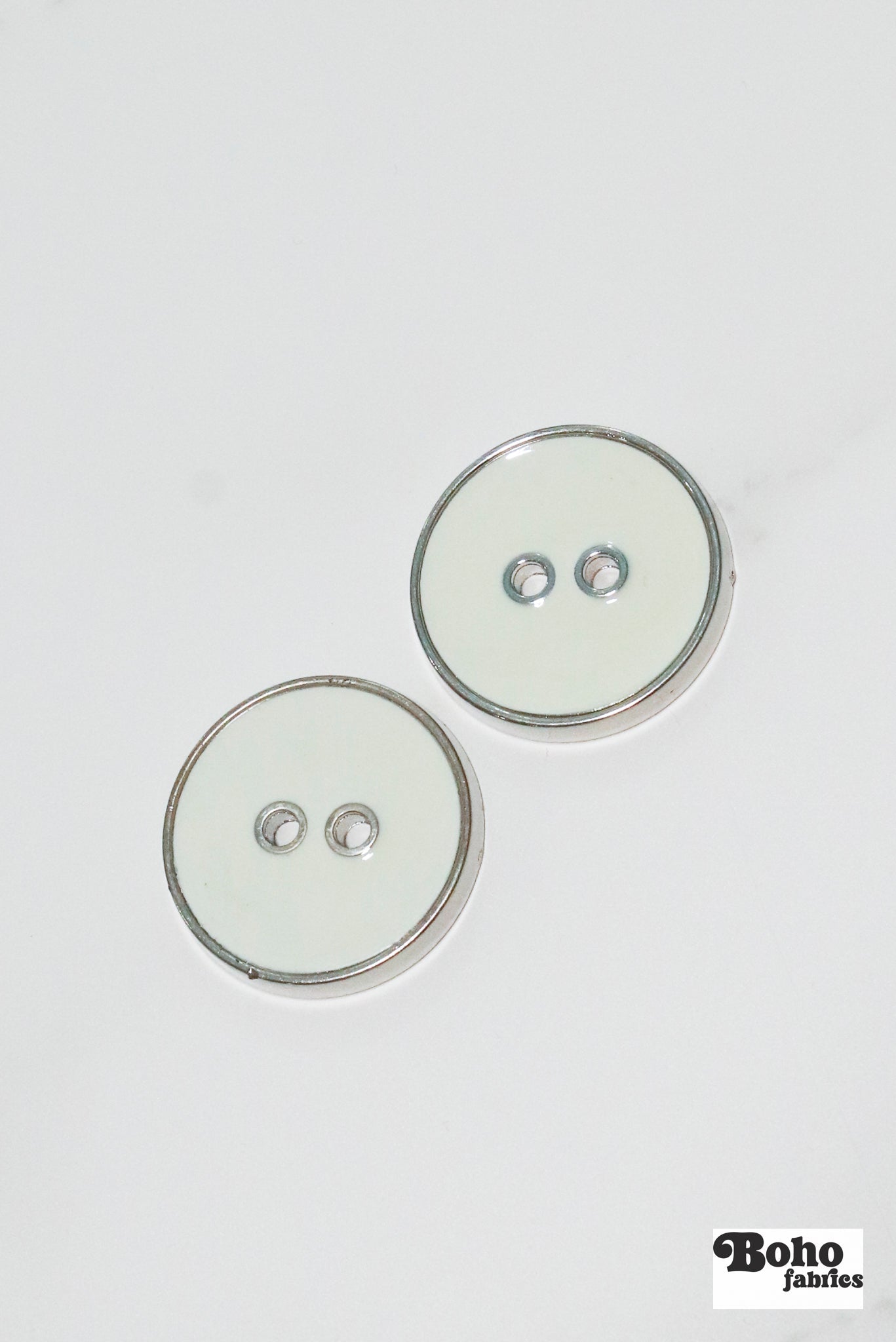 Off White Silver Rimmed Two - hole Buttons. Available in 12.5mm (20L), 15mm (24L), 19mm (30L), 23mm (36L) - Boho Fabrics - Buttons & Snaps