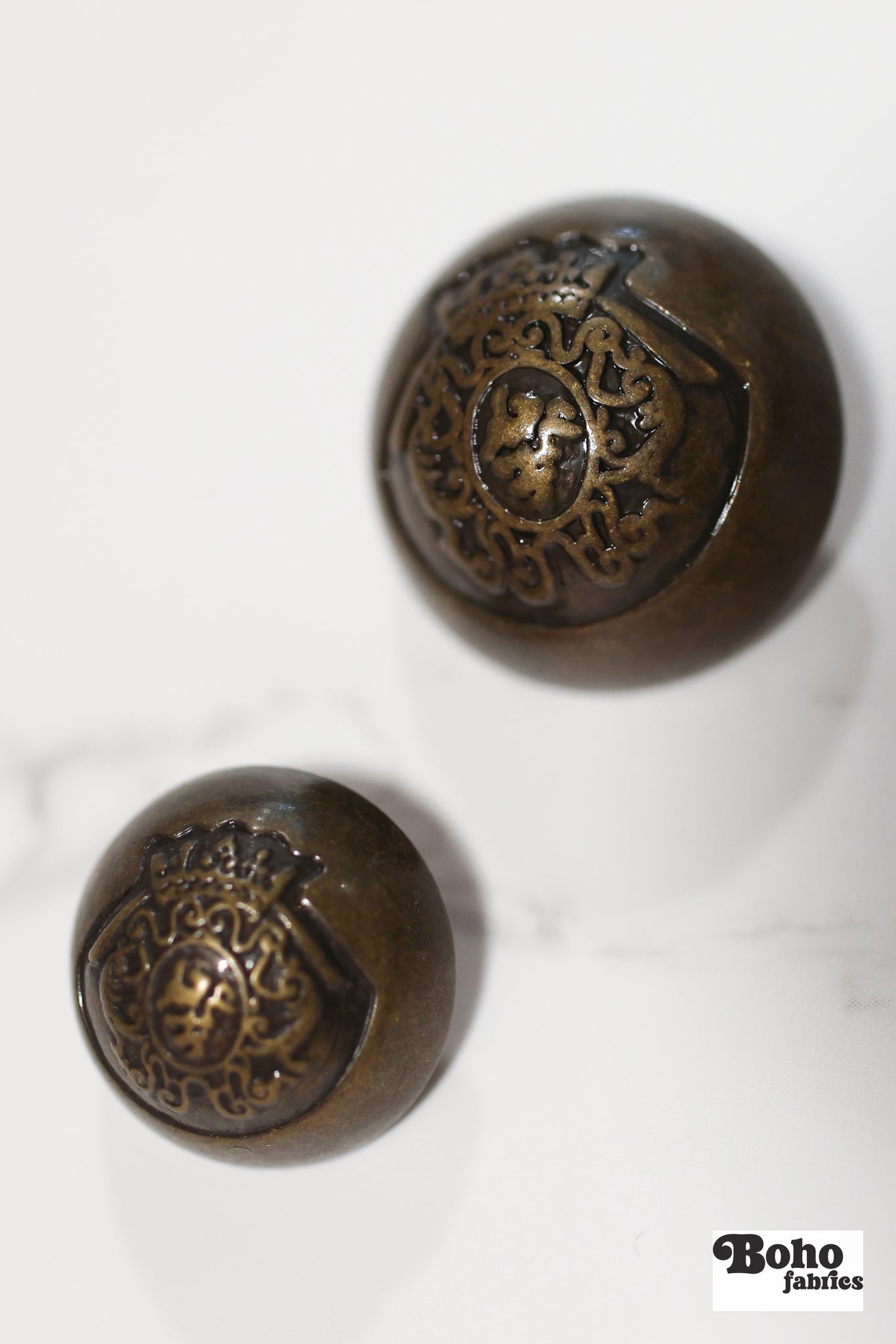 Royalty Crest Bronze Plastic, Dome Shank Button. Available in 11/16" (18mm, 28L) and 15/16", (24mm, 38L) - Boho Fabrics - Buttons & Snaps