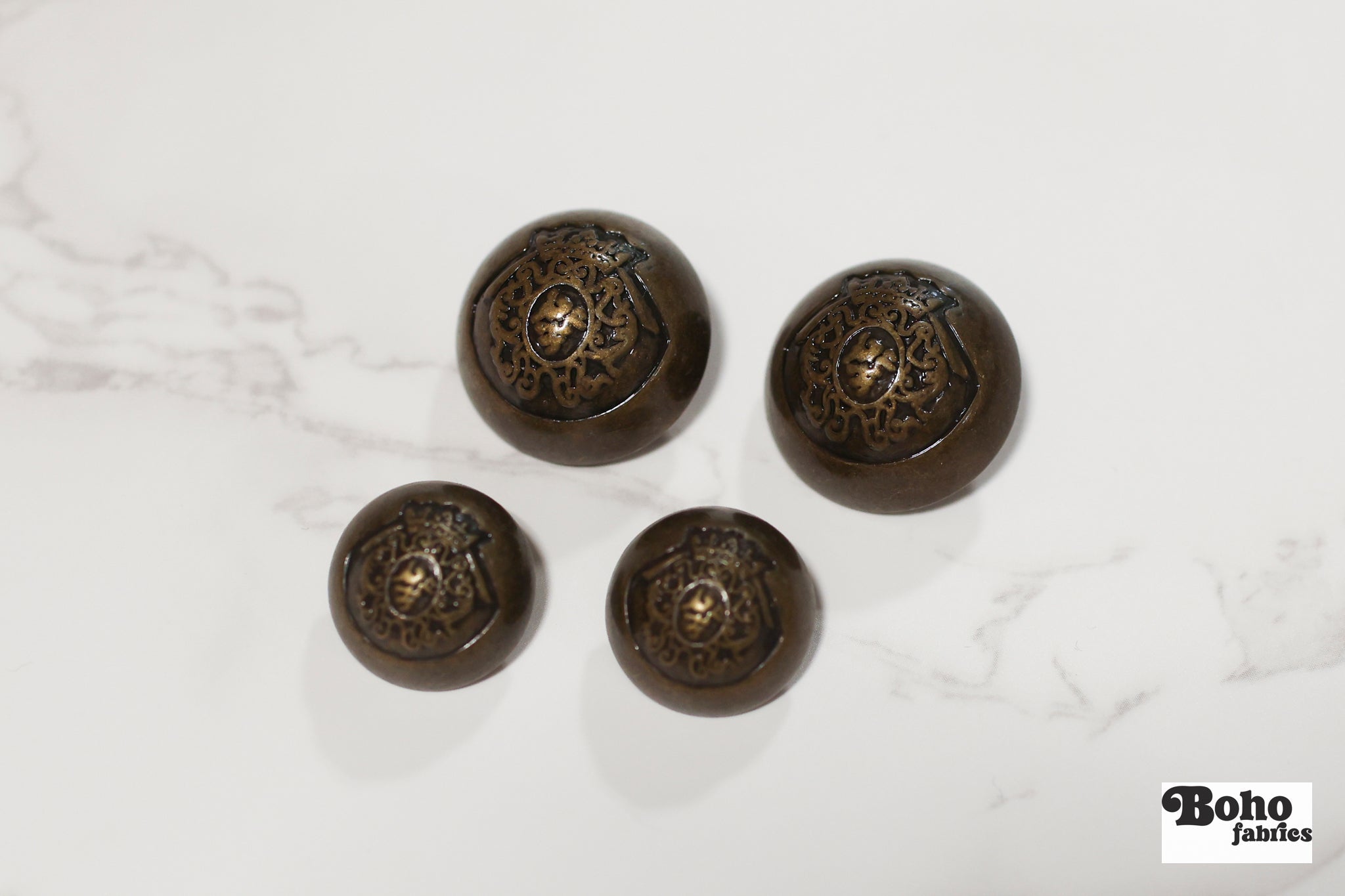 Royalty Crest Bronze Plastic, Dome Shank Button. Available in 11/16" (18mm, 28L) and 15/16", (24mm, 38L) - Boho Fabrics - Buttons & Snaps
