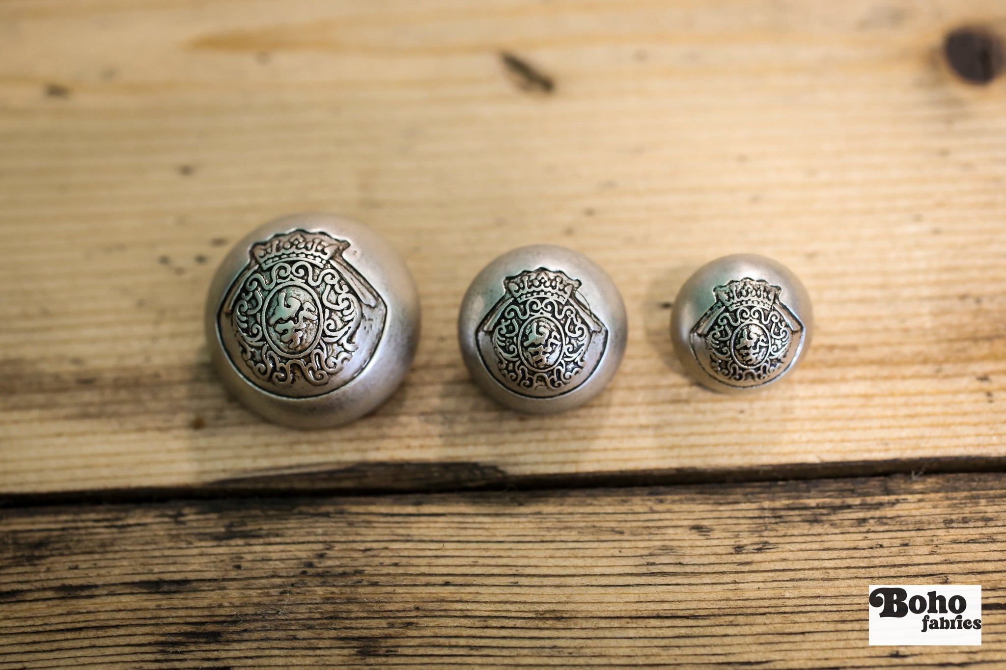 Royalty Crest Silver Plastic, Dome Shank Button. Available in 5/8" (15mm, 24L), 11/16", (18mm, 28L) and 7/8", (23mm, 36L) - Boho Fabrics - Buttons & Snaps
