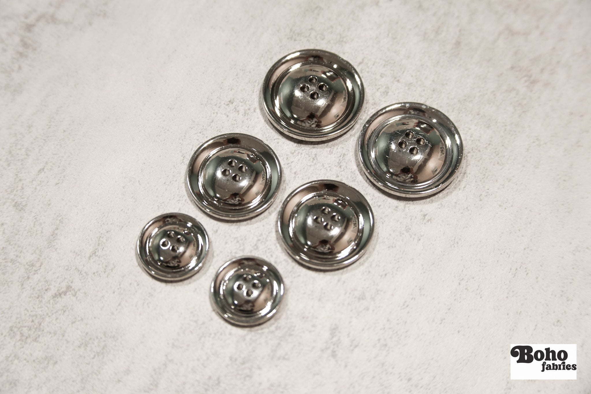 Silver, 4 Hole Plastic Buttons. 28L (18mm/11/16"), 36L (23mm/7/8"), 48L (30mm/ 1 1/4"), 54L (34mm/ 1 3/8") - Boho Fabrics - Buttons & Snaps