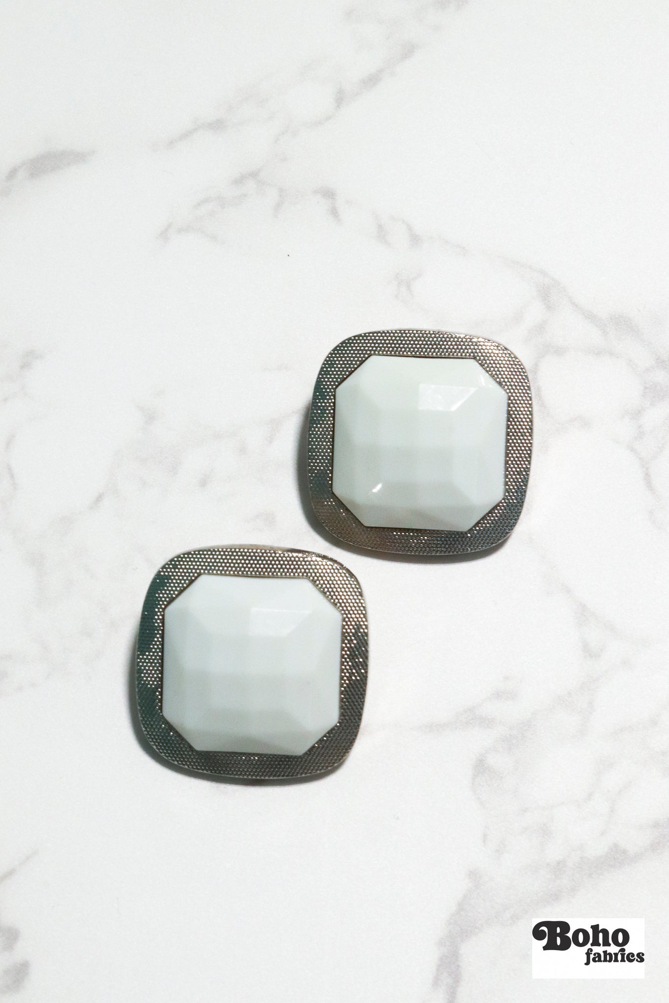 Silver Rimmed White Faceted Square Plastic Shank Buttons. Available in 15mm (24L), 18mm (28L), 25mm (40L), and 28mm (44L) - Boho Fabrics - Buttons & Snaps