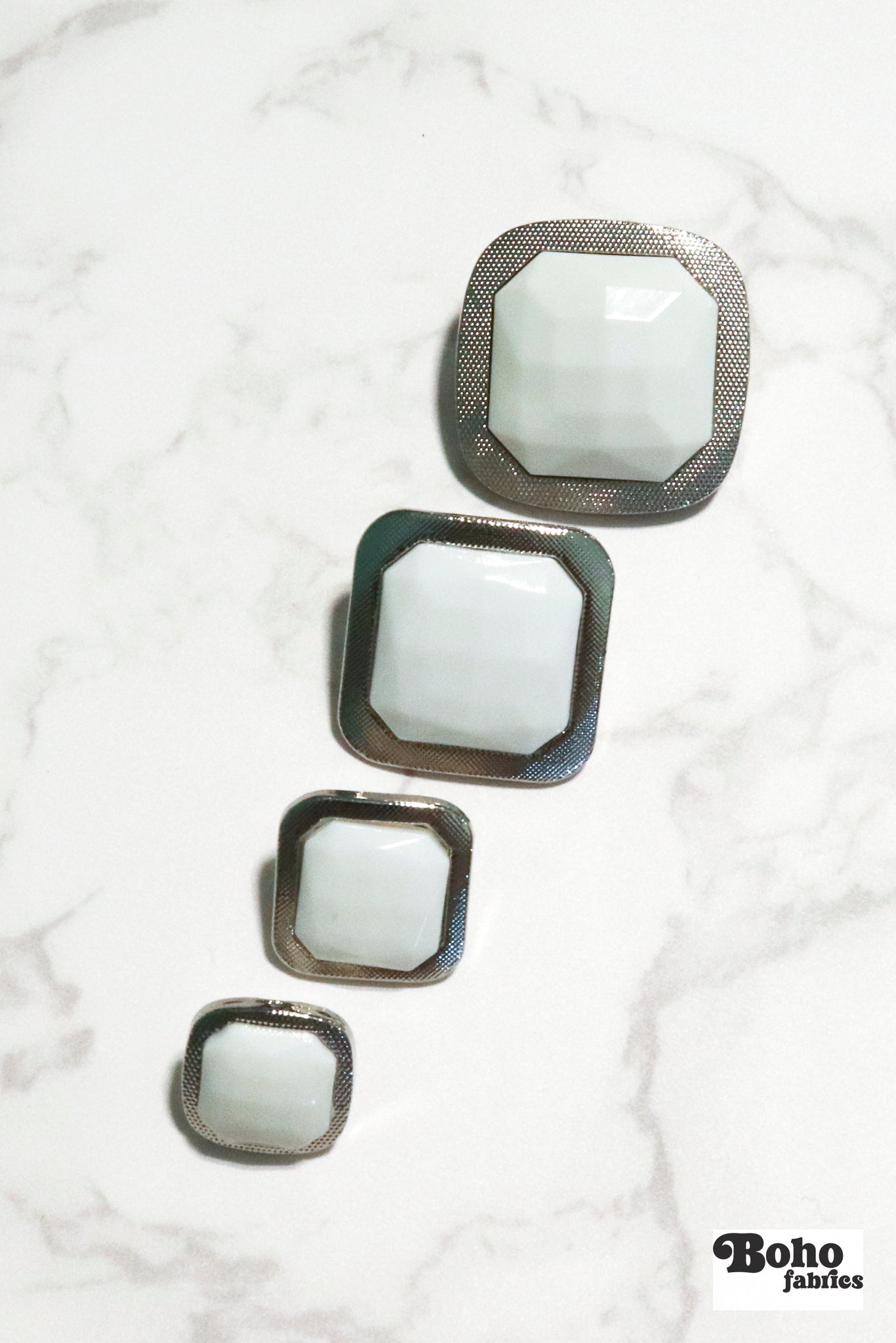 Silver Rimmed White Faceted Square Plastic Shank Buttons. Available in 15mm (24L), 18mm (28L), 25mm (40L), and 28mm (44L) - Boho Fabrics - Buttons & Snaps