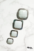 Silver Rimmed White Faceted Square Plastic Shank Buttons. Available in 15mm (24L), 18mm (28L), 25mm (40L), and 28mm (44L) - Boho Fabrics - Buttons & Snaps