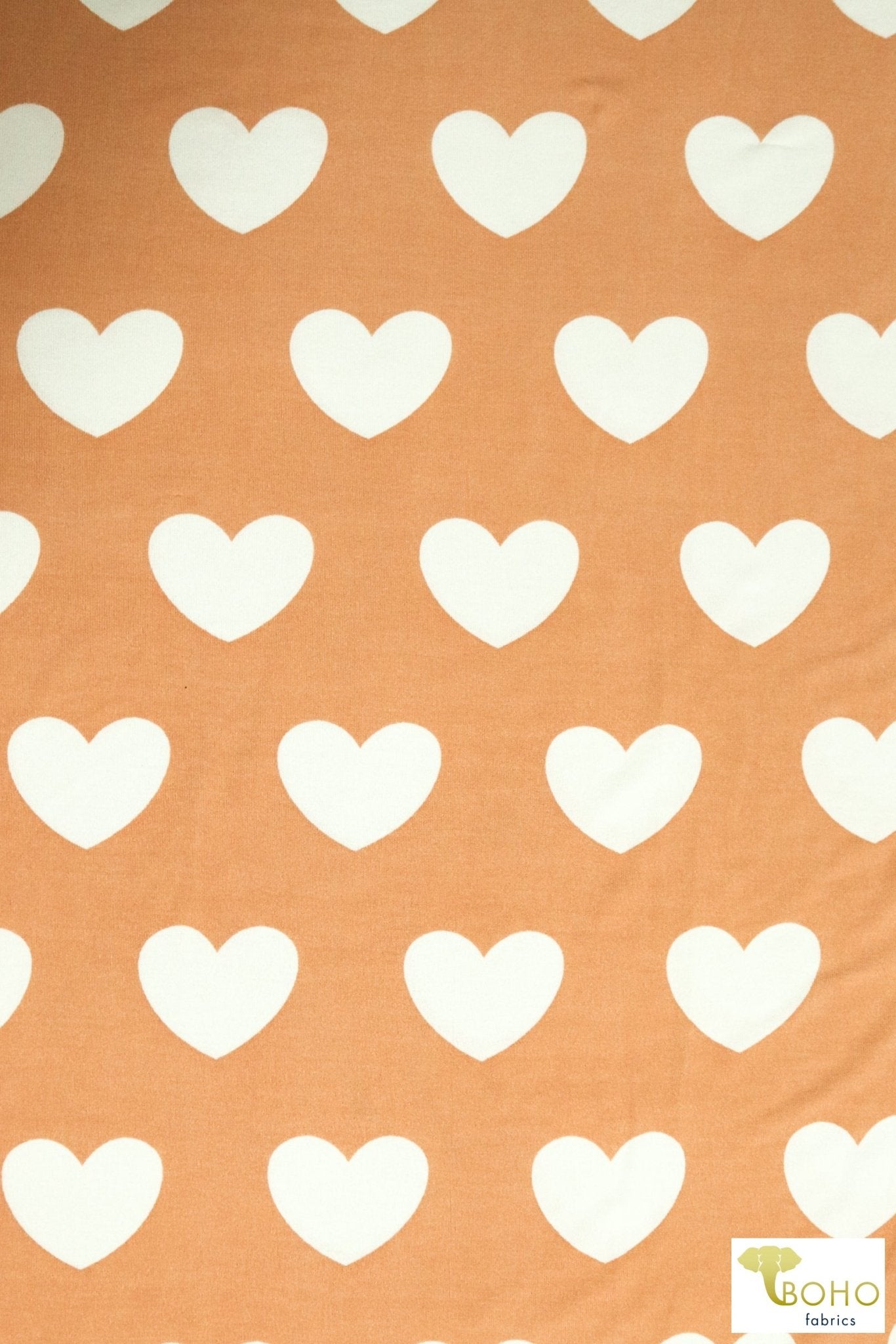 White Hearts on Apricot. Printed Hacci Sweater Knit. PRSW-121-ORJ - Boho Fabrics